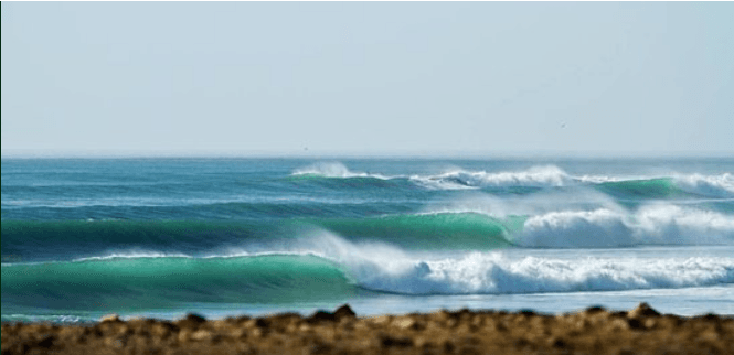K12 surf spot near Awrir with Atlantic waves breaking along the coast